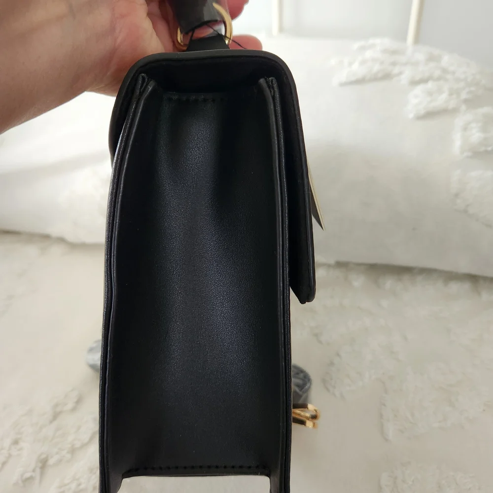 Badgley Mischka Black Vegan Leather Top-Handle Satchel With Crossbody Strap.